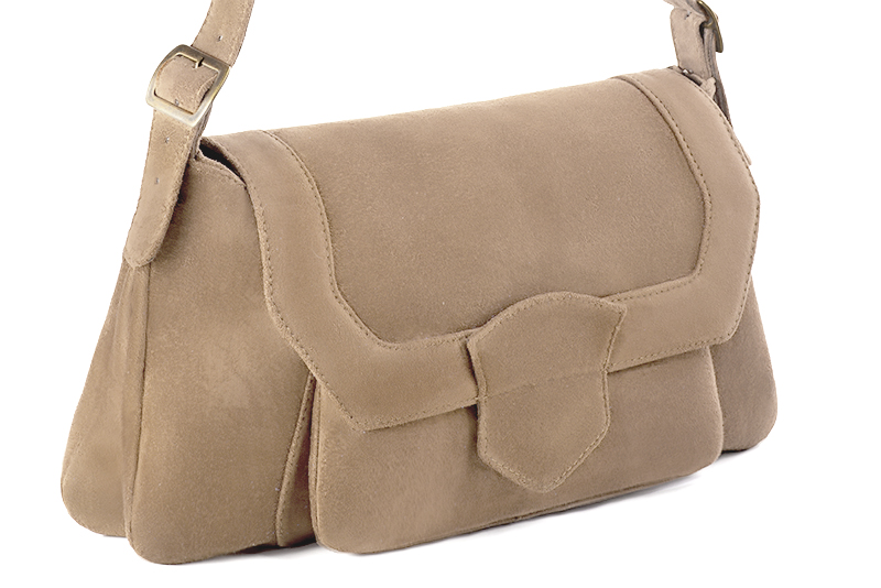 Handcrafted women's luxurious elegant handbag in premium tan beige leather. Perfect for elevated everyday style.   
                Choose from our luxurious collections of leather and fabric to perfectly match your handbags to your outfits.